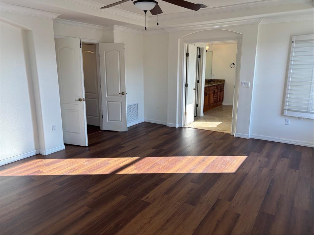 8606 Stone Harbour Loop Bradenton, FL 34212 - Photo 15 of 22 wooden floor in an empty room
