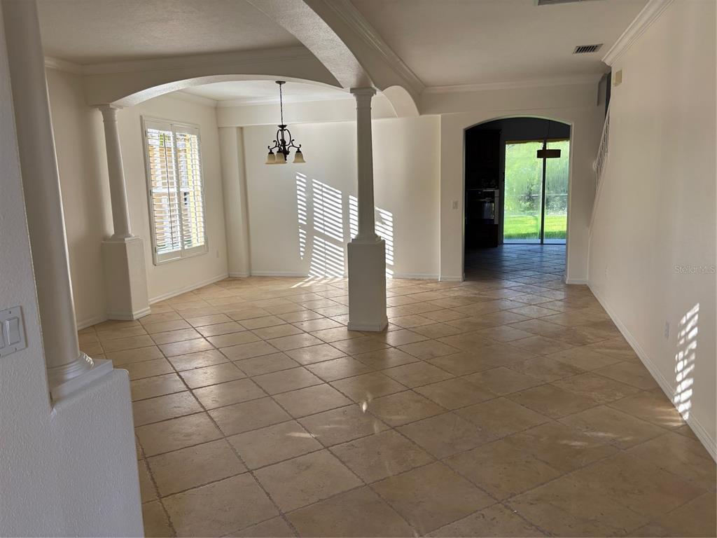 8606 Stone Harbour Loop Bradenton, FL 34212 - Photo 3 of 22 a view of a hallway with windows