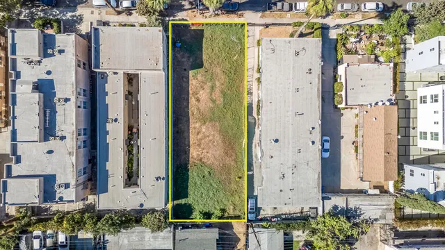 a view of city with tall buildings