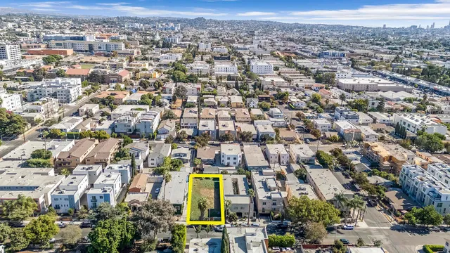 an aerial view of a city with lots of residential buildings