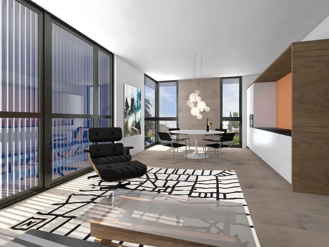 a view of a living room and kitchen