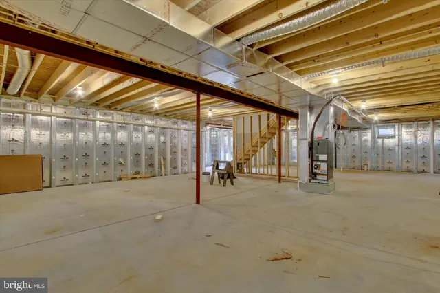 a view of an empty room with glass door