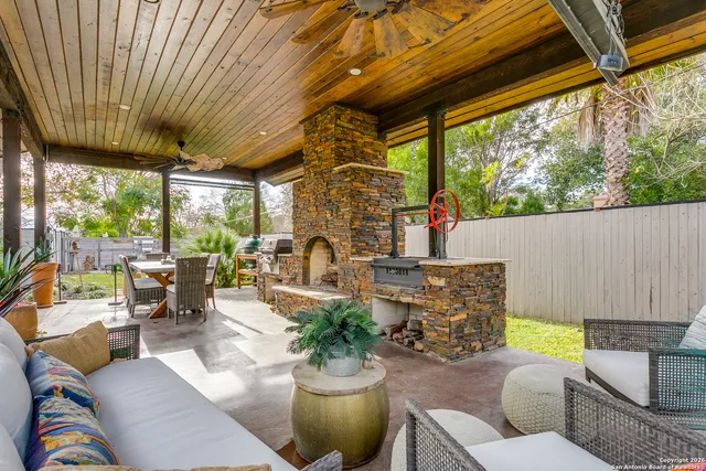 a outdoor living space with furniture and garden view