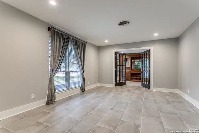 an empty room with windows