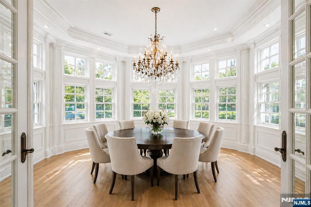 67 Robin Lane Alpine, NJ 07620 - Photo 14 of 40 a view of a dining room with furniture window and wooden floor