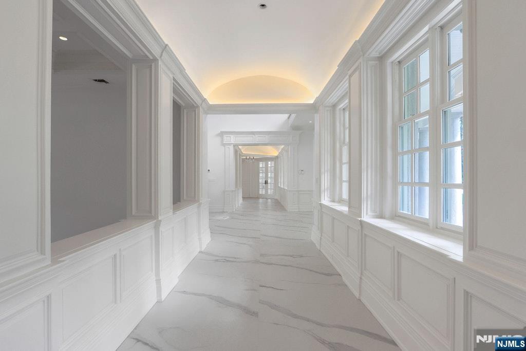 67 Robin Lane Alpine, NJ 07620 - Photo 23 of 40 a view of a hallway with windows