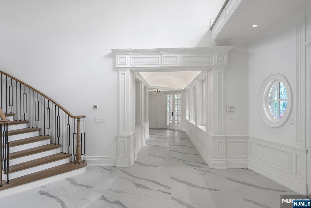 67 Robin Lane Alpine, NJ 07620 - Photo 7 of 40 a view of entryway with wooden floor