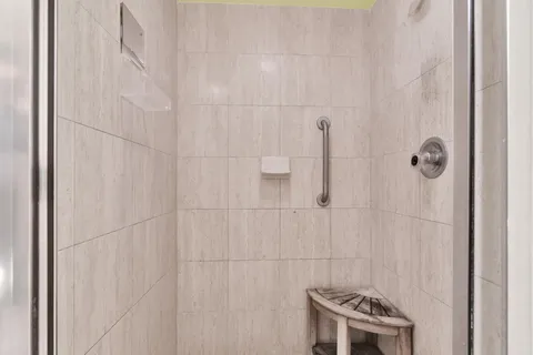 a view of a backyard with swimming pool