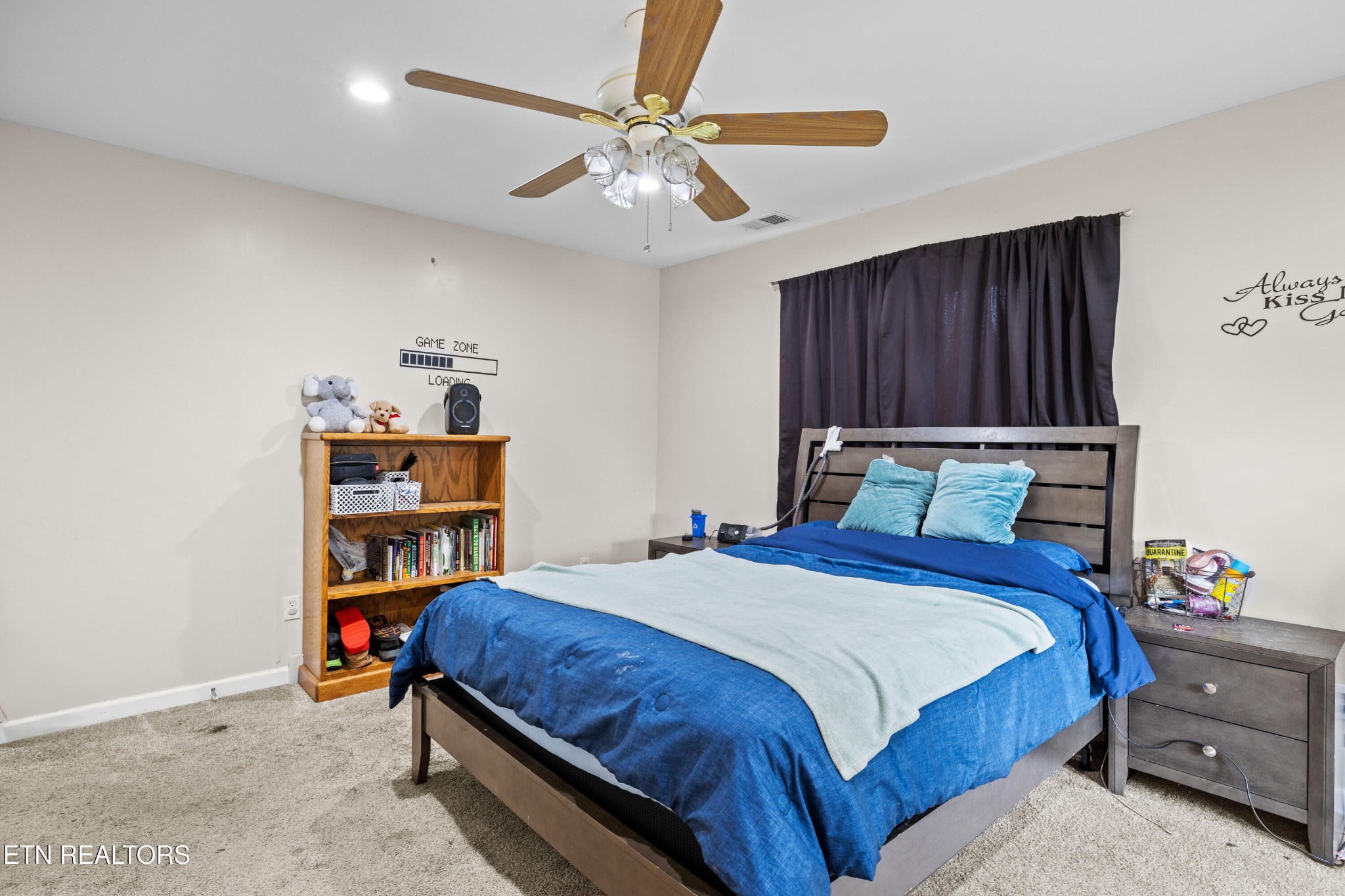 706 Broad Street Sweetwater, TN 37874 - Photo 19 of 28 a bedroom with a bed and closet