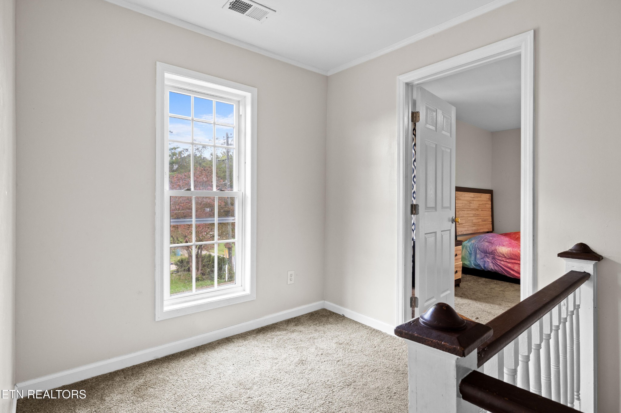 706 Broad Street Sweetwater, TN 37874 - Photo 21 of 28 a view of an empty room and window