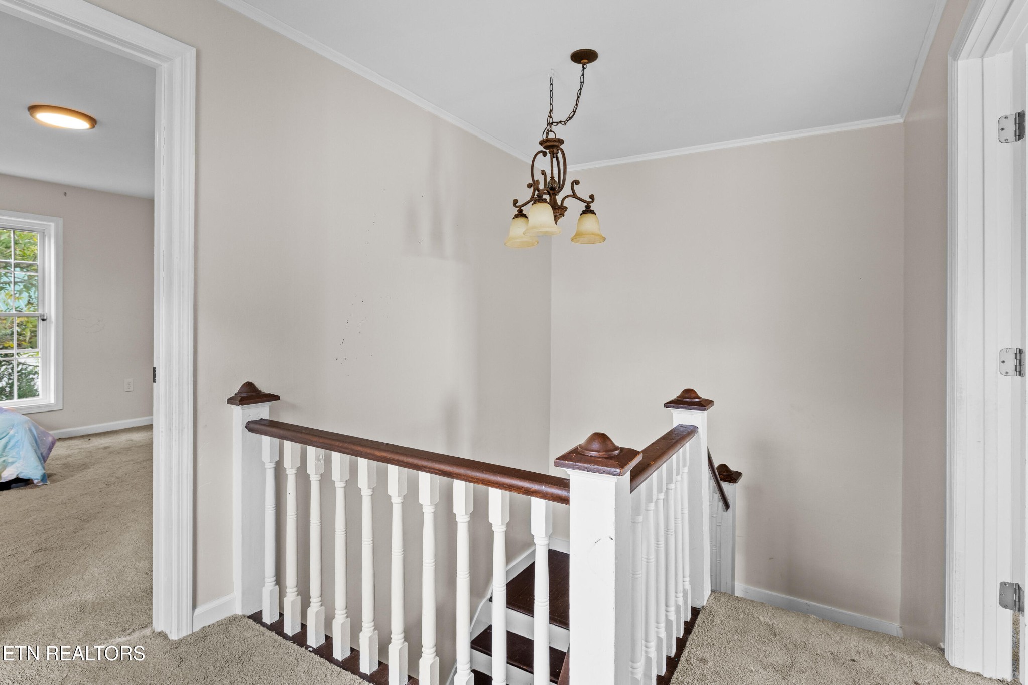 706 Broad Street Sweetwater, TN 37874 - Photo 22 of 28 a view of a hallway with windows