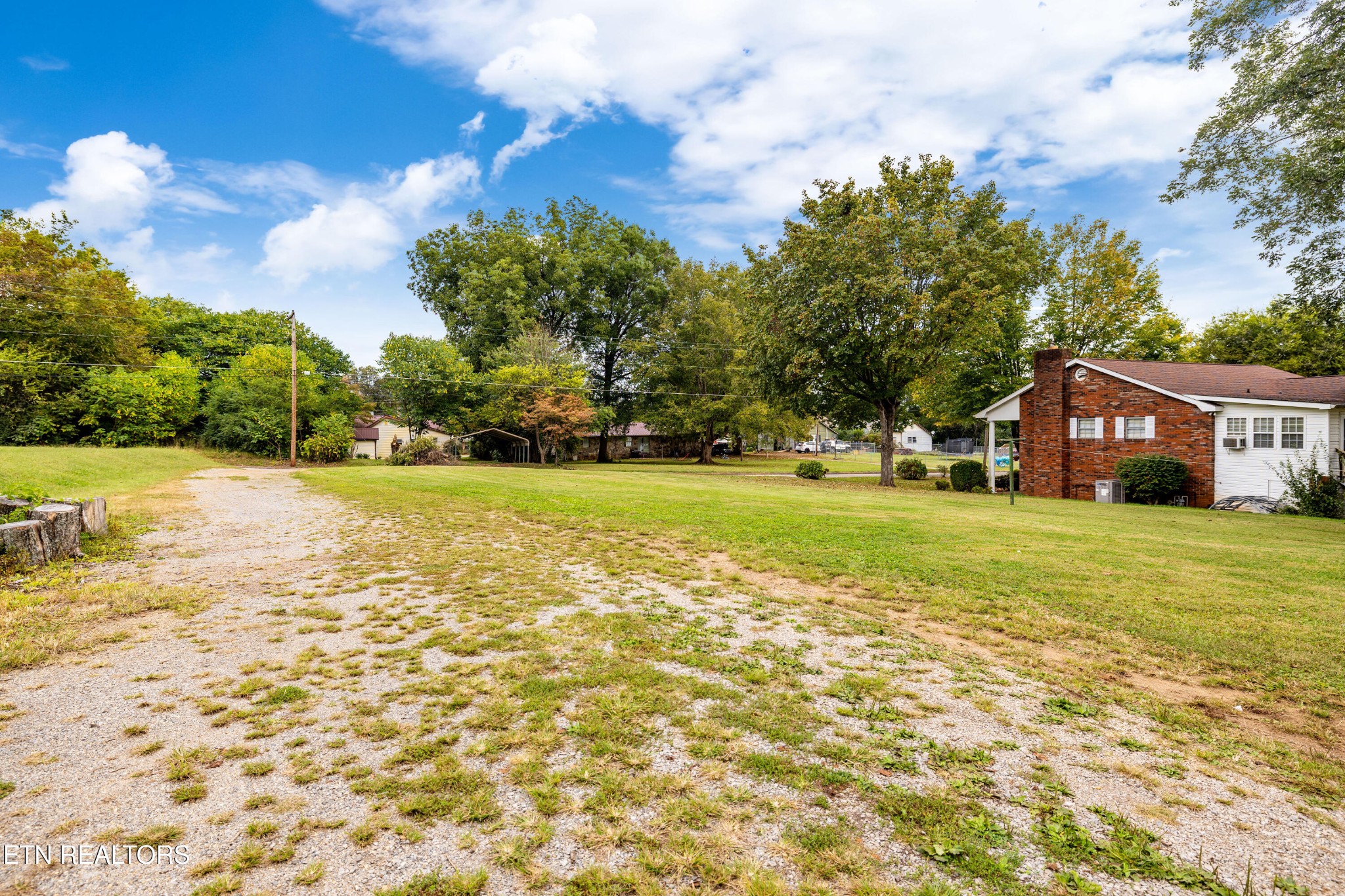 706 Broad Street Sweetwater, TN 37874 - Photo 27 of 28 a view of an house with backyard space and balcony