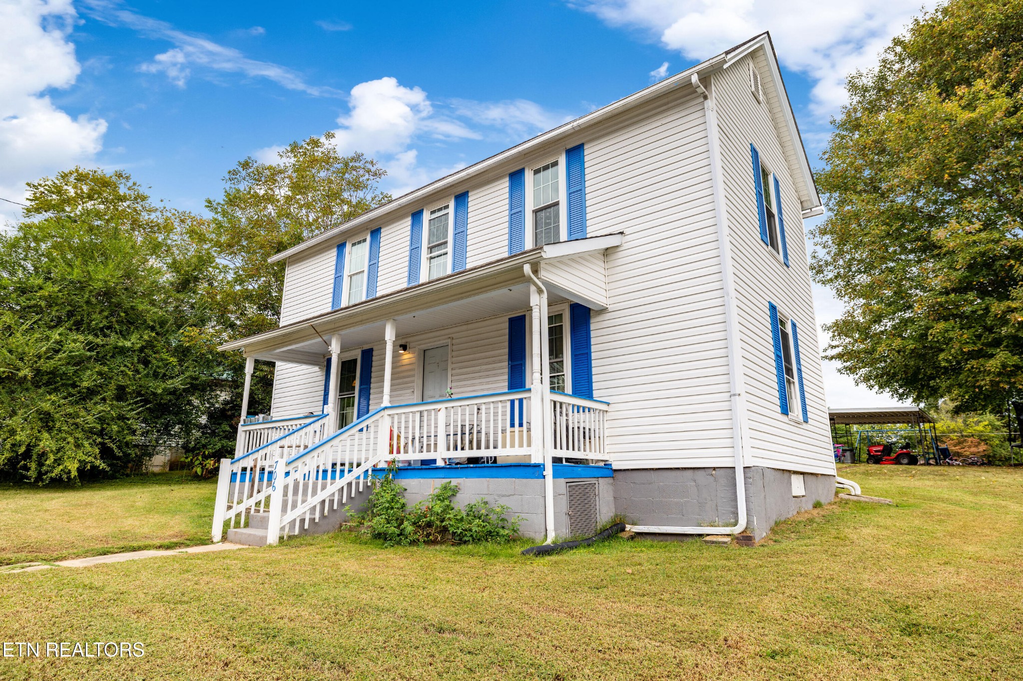 706 Broad Street Sweetwater, TN 37874 - Photo 3 of 28 a front view of house with yard and green space