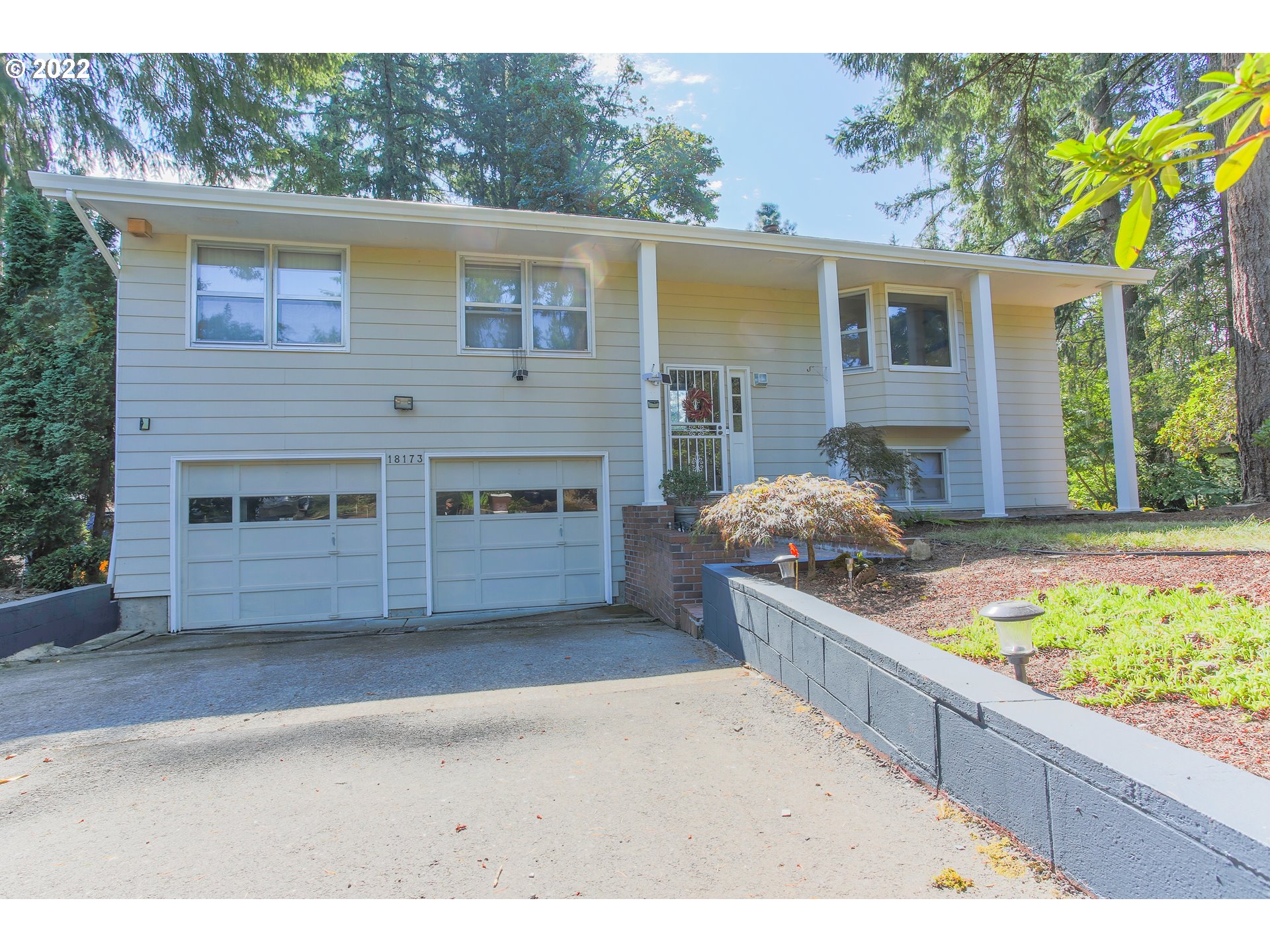 18173 Southeast Richey Road Gresham, OR 97080 - Photo 1 of 23 a view of a house with a back yard