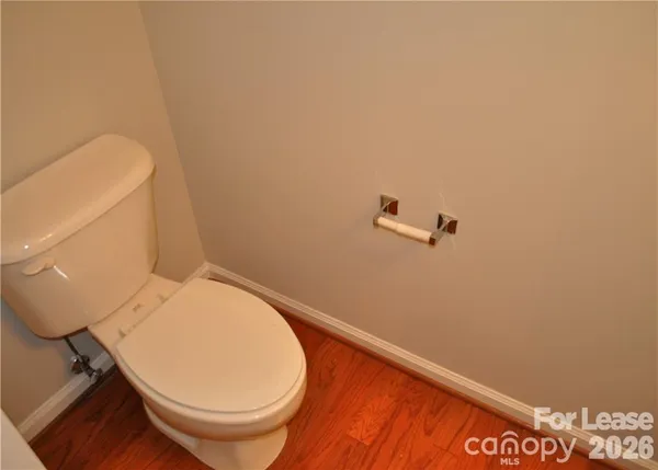 a bathroom with a toilet and a sink