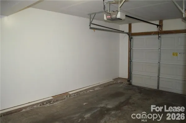 an empty room with wooden floor