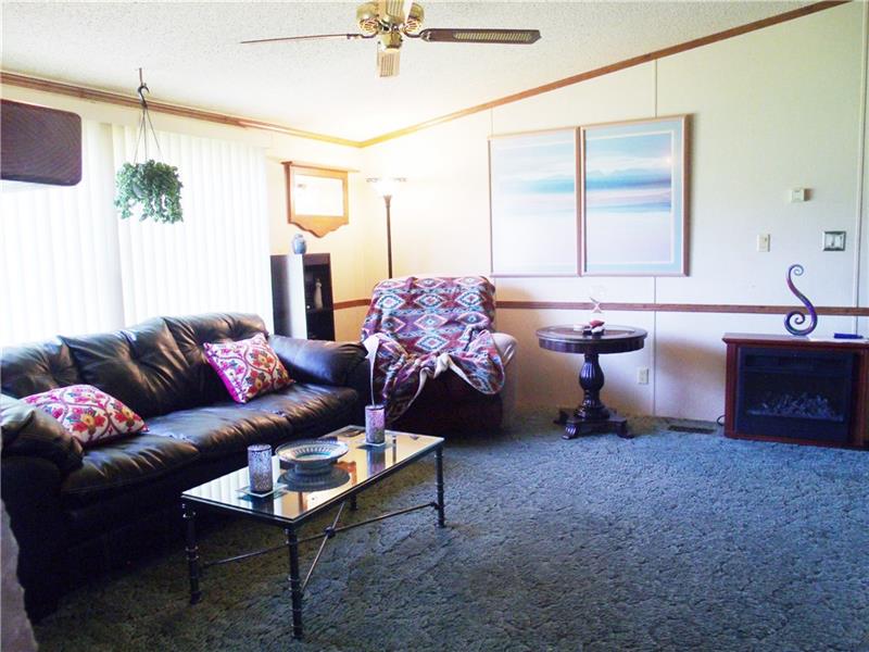 5269 Richland Road Gibsonia, PA 15044 - Photo 2 of 19 NICE SIZED LIVING ROOM A LARGE WINDOW LOOKING ONTO THE PRIVATE REAR YARD