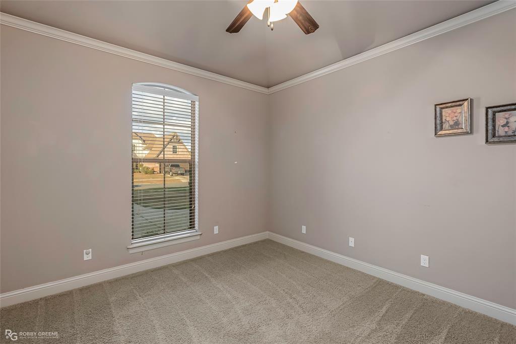 110 St Andrews Benton, LA 71006 - Photo 21 of 28 an empty room with windows and closet