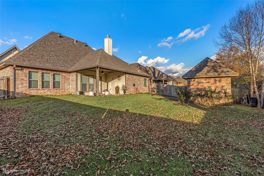 110 St Andrews Benton, LA 71006 - Photo 28 of 28 a view of a house with a yard