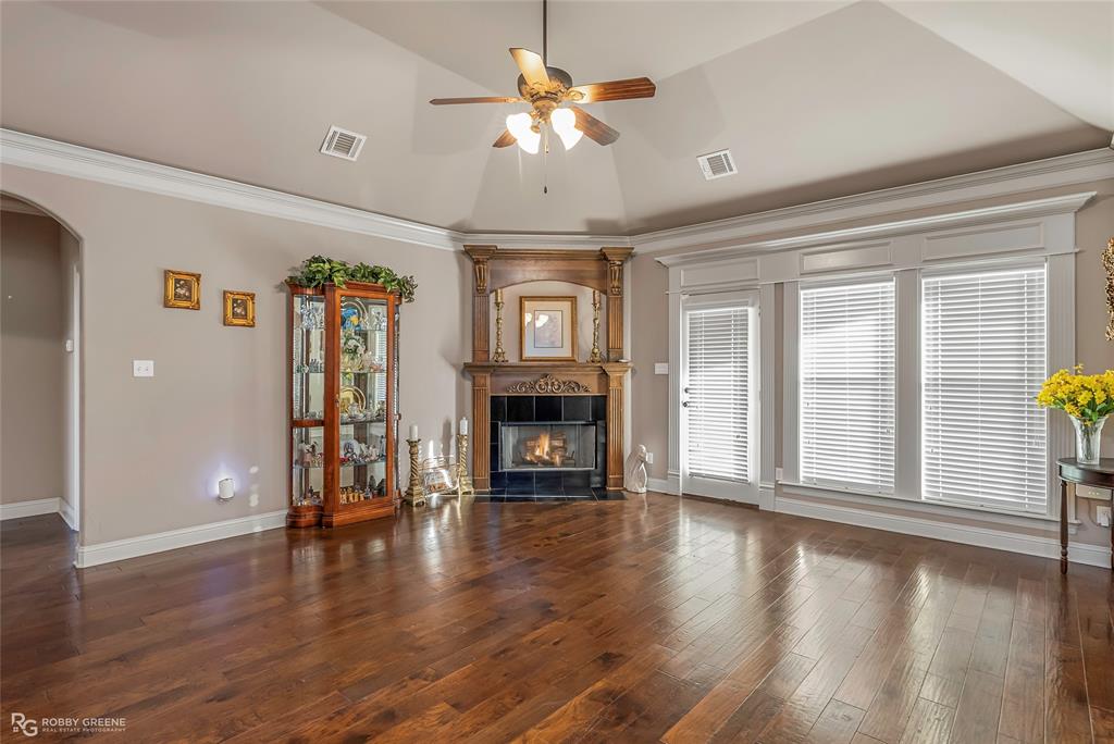 110 St Andrews Benton, LA 71006 - Photo 5 of 28 a view of an empty room with a window and fireplace