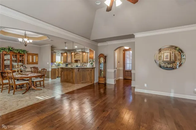 an entryway and livingroom with furniture