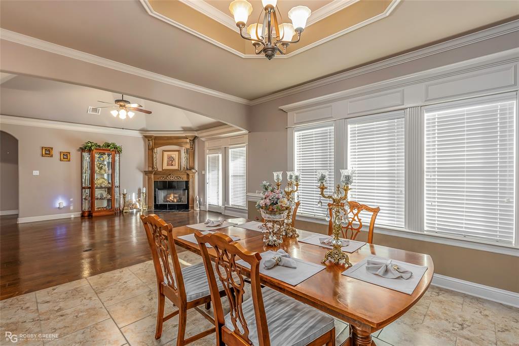 110 St Andrews Benton, LA 71006 - Photo 9 of 28 a view of a dining room with furniture window and wooden floor