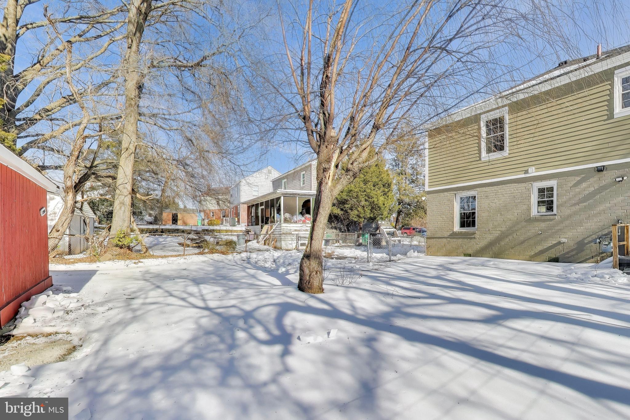 6904 Riggs Road Hyattsville, MD 20783 - Photo 24 of 34 a view of road with large trees