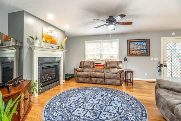 a spacious bedroom with a bed and a couch