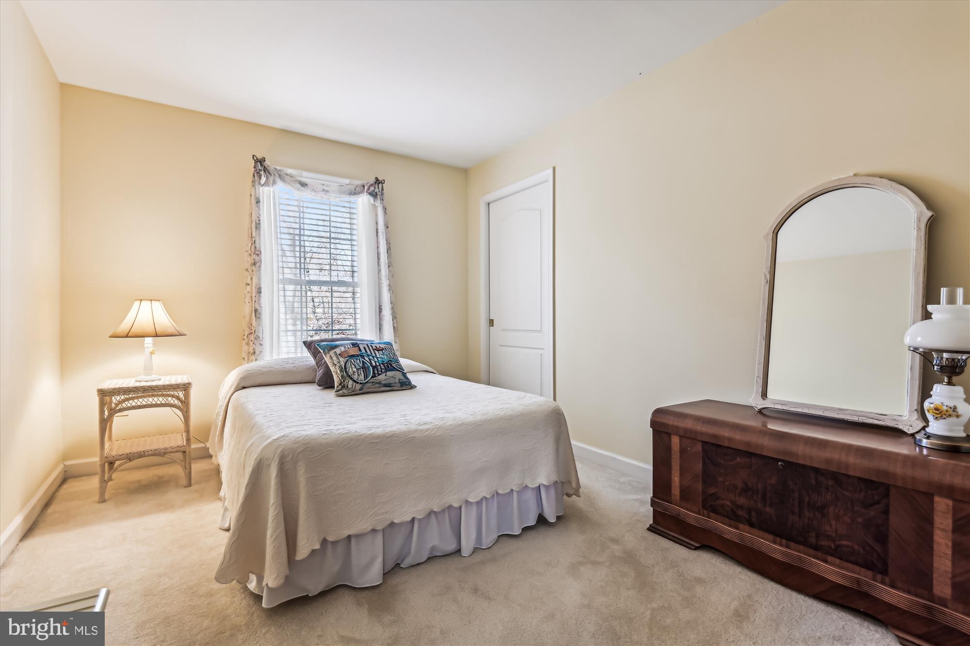 2620 Gunpowder Farms Road Fallston, MD 21047 - Photo 24 of 35 a bedroom with a bed and a night stand