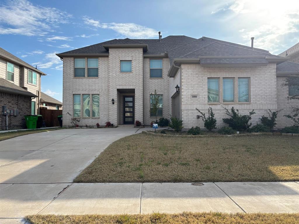 1080 Canuela Way Justin, TX 76247 - Photo 2 of 30 a front view of a house with a yard