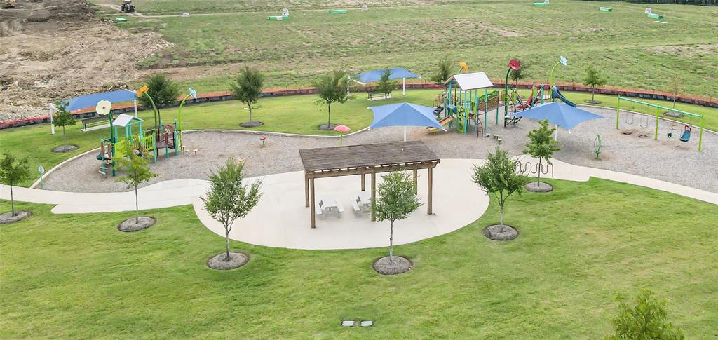 1080 Canuela Way Justin, TX 76247 - Photo 25 of 30 swimming pool view with a garden and seating area