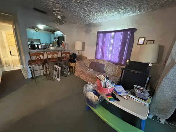 a room with furniture and a window