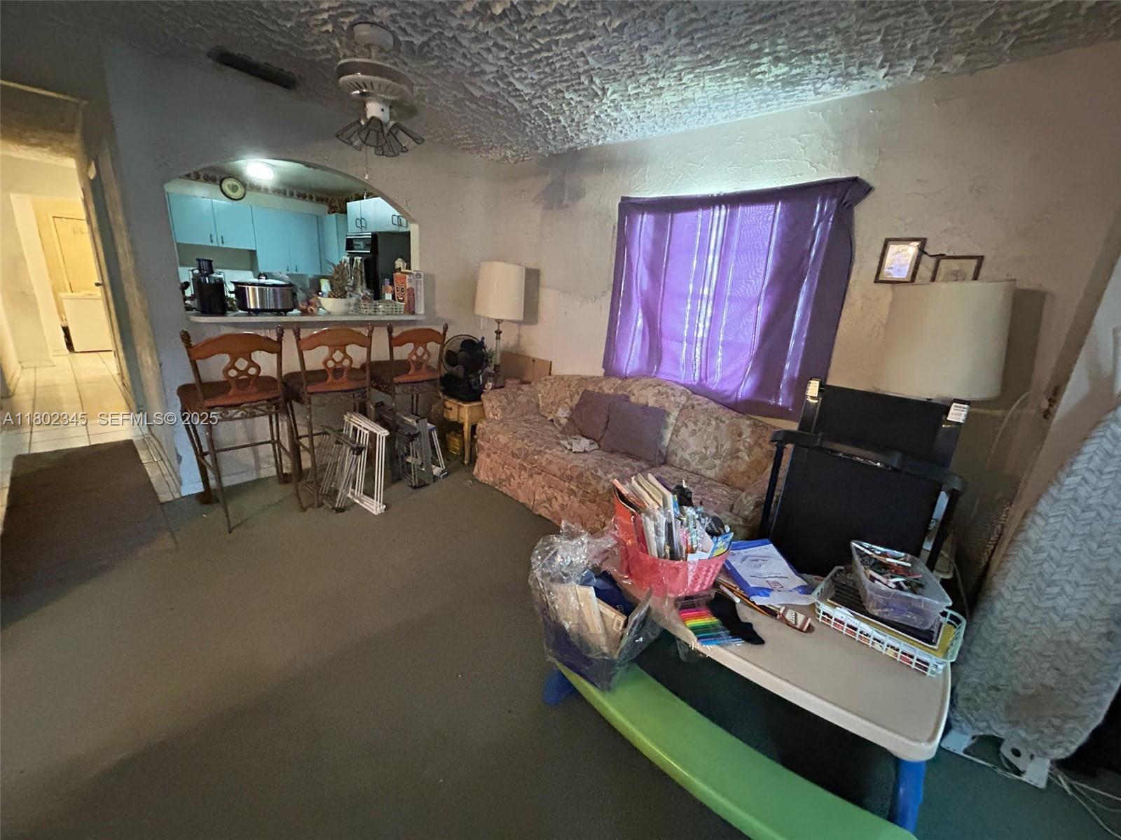 10354 Southwest 173rd Street Miami, FL 33157 - Photo 8 of 12 a room with furniture and a window