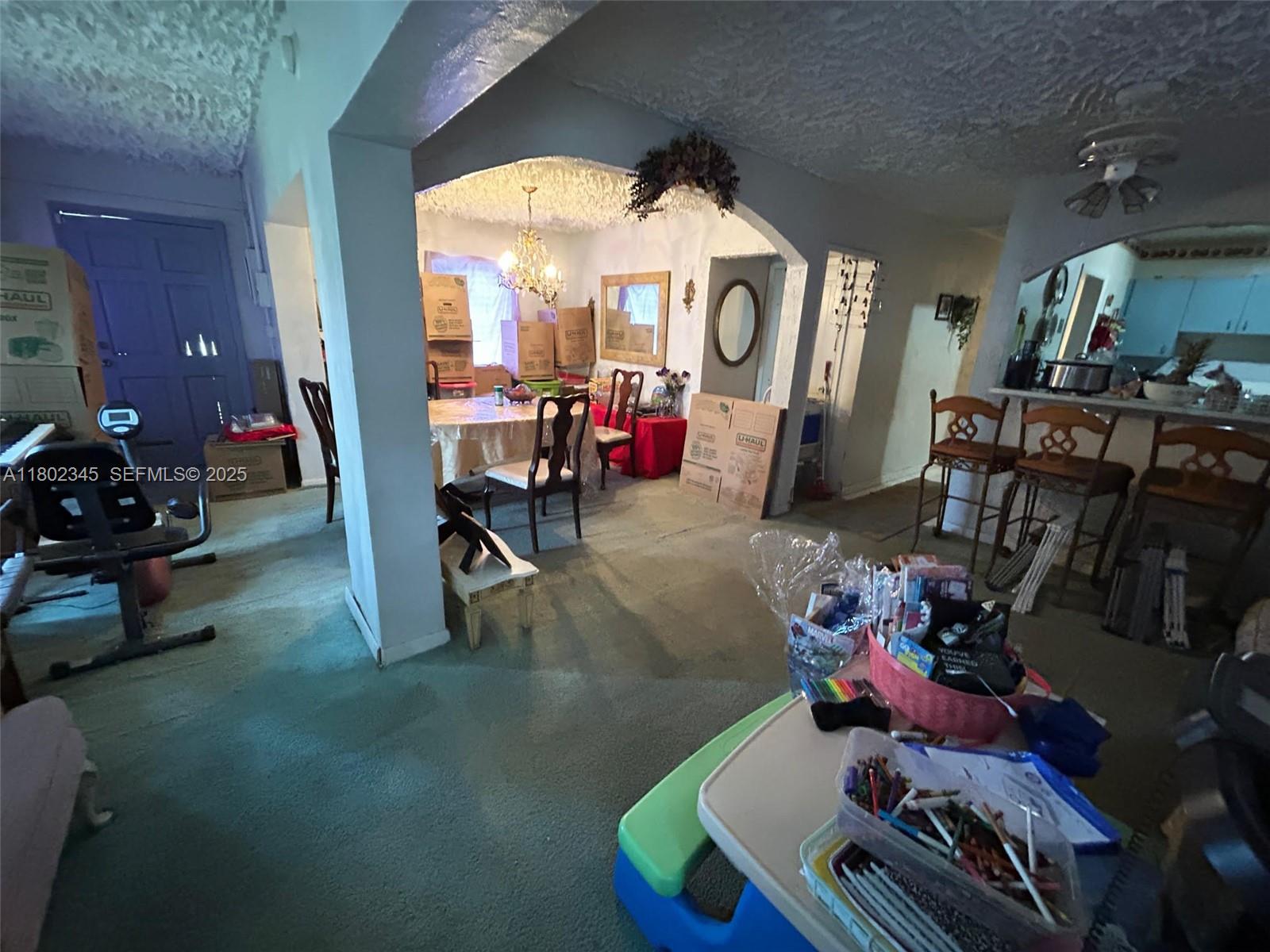 10354 Southwest 173rd Street Miami, FL 33157 - Photo 10 of 12 a room with lots of flower equipment