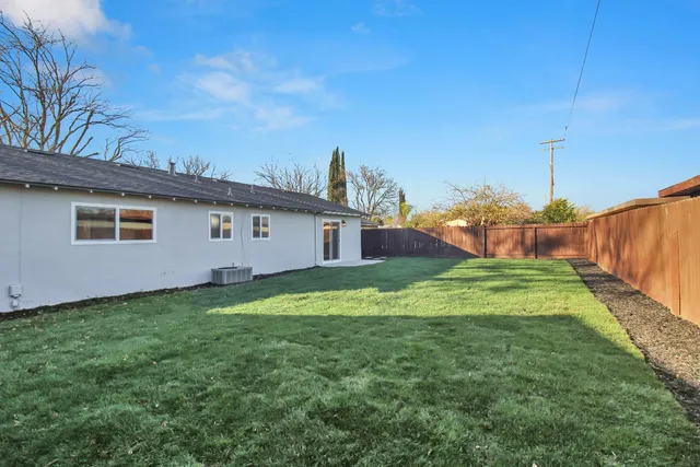 a terrace with wooden fence