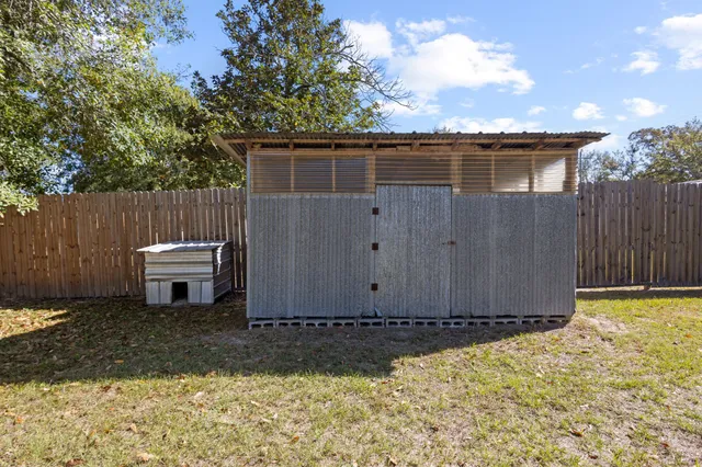 a backyard of a house with seating space