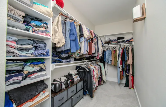 a bathroom with a double vanity sink mirror and double
