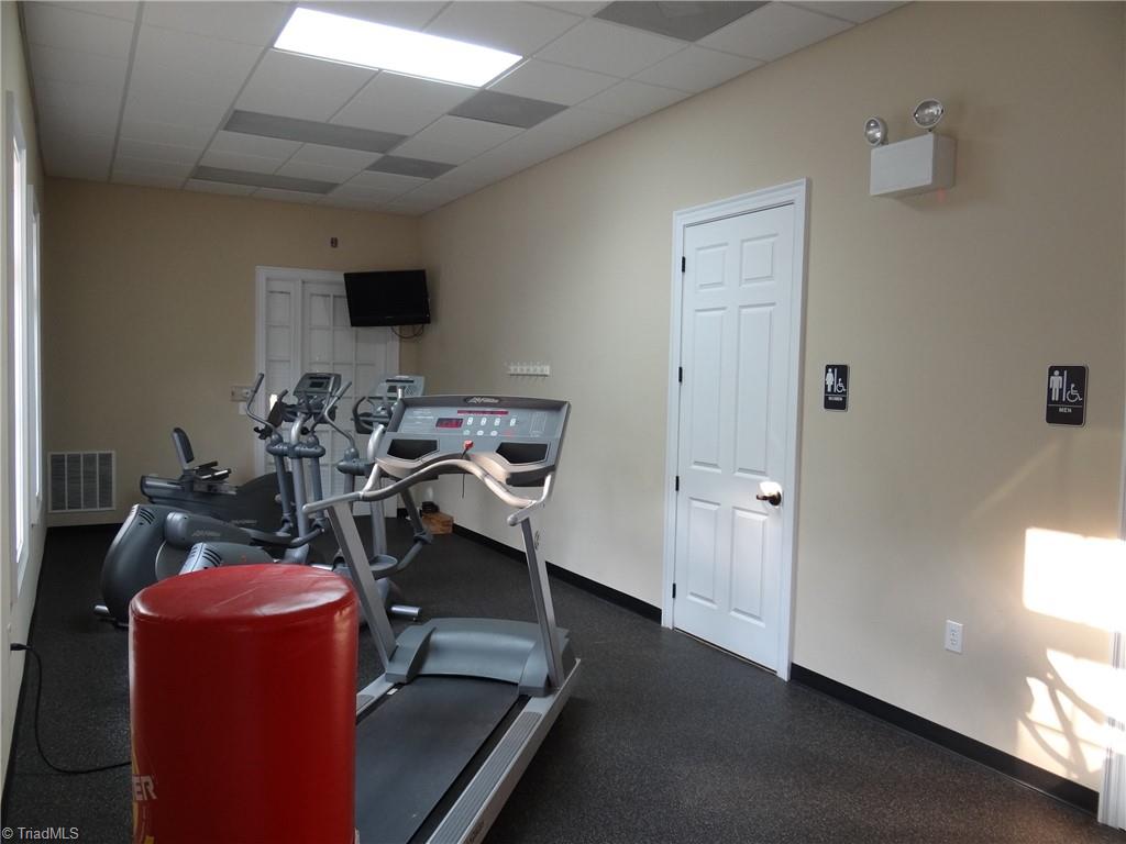 8409 Exmoor Trace Browns Summit, NC 27214 - Photo 44 of 47 Community fitness center