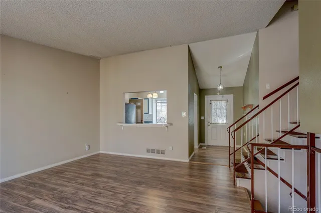 a view of entryway with wooden floor