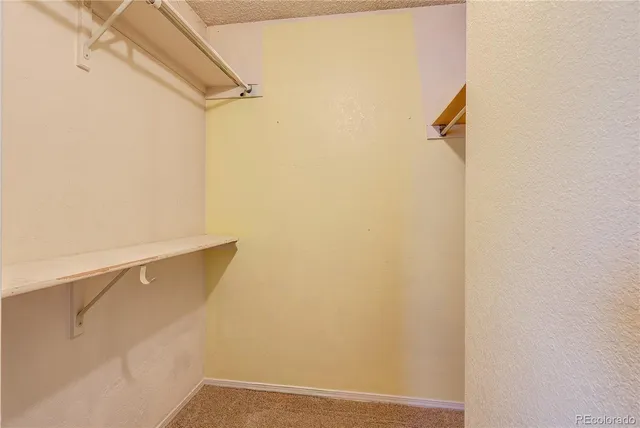 a view of small space with racks on the wall