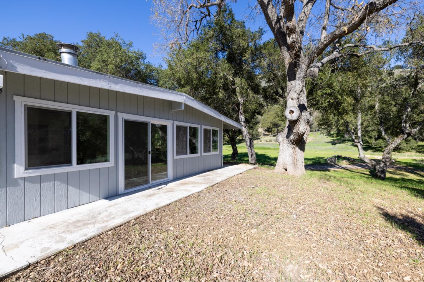47292 Arroyo Seco Road Greenfield, CA 93927 - Photo 12 of 37 a front view of a house with a garden