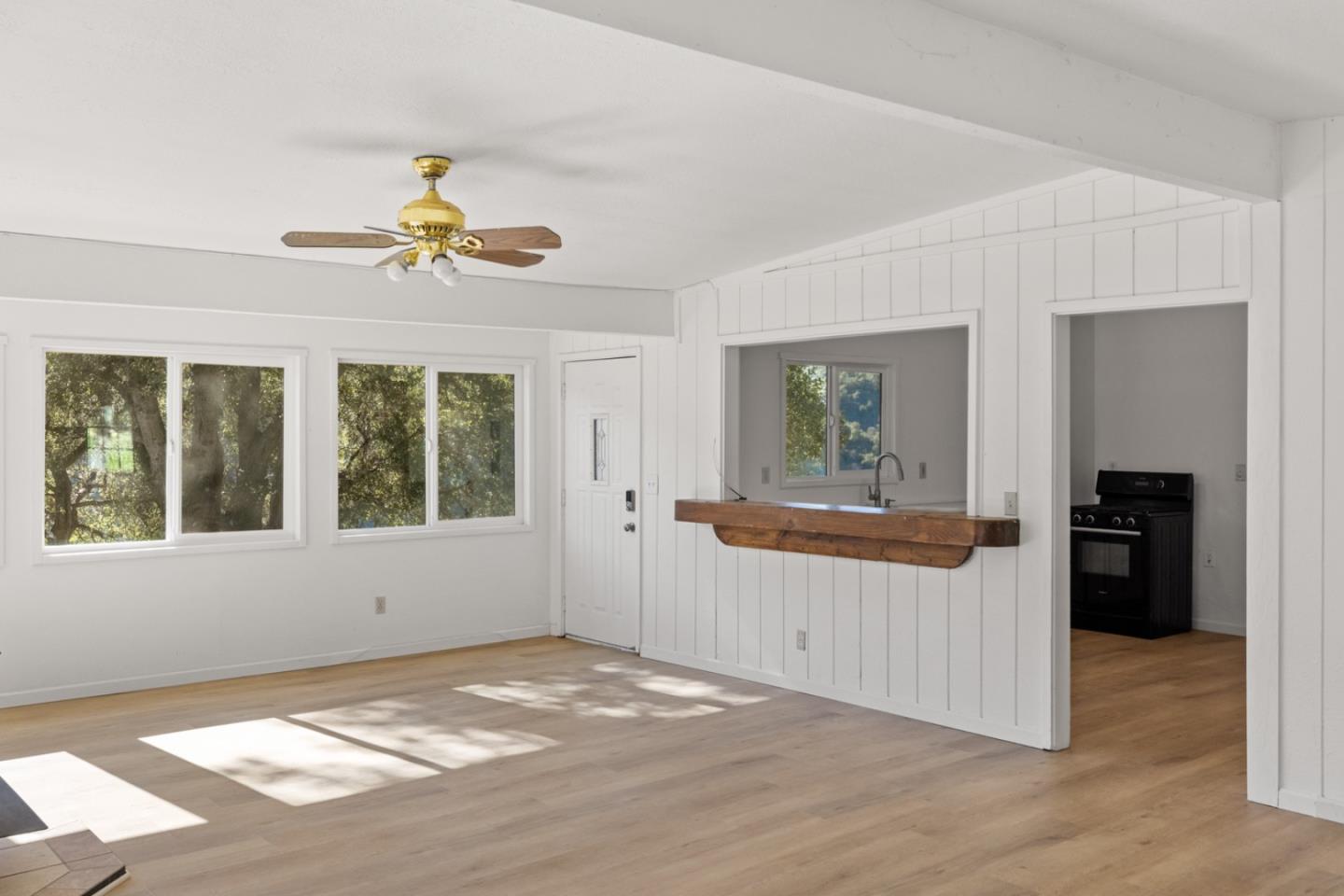 47292 Arroyo Seco Road Greenfield, CA 93927 - Photo 17 of 37 a view of a kitchen with a sink cabinet and a window