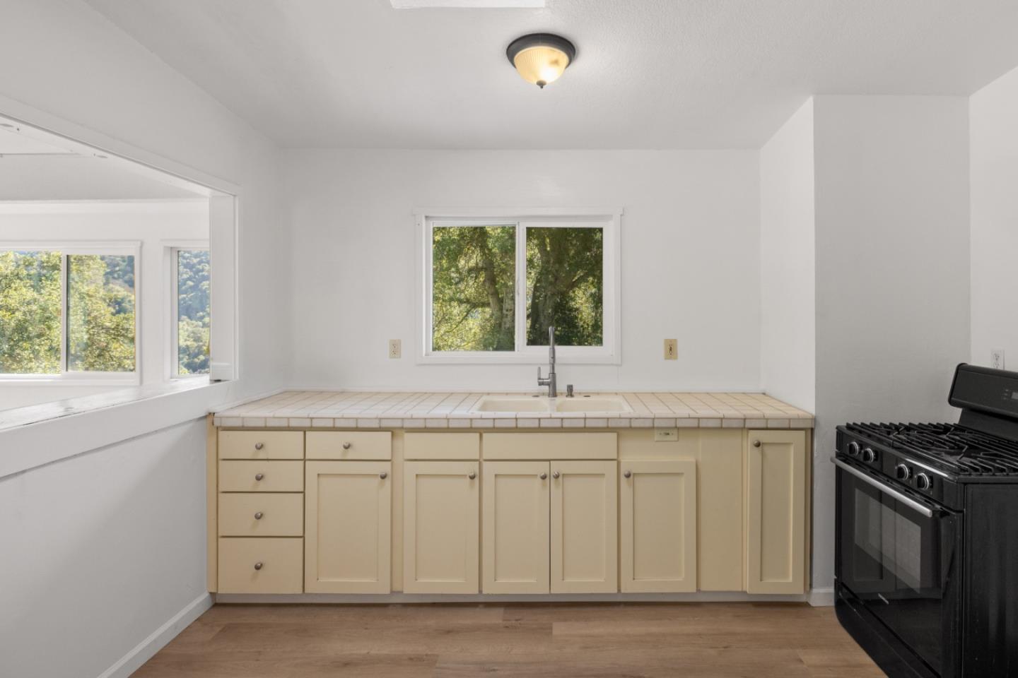 47292 Arroyo Seco Road Greenfield, CA 93927 - Photo 18 of 37 a kitchen with a sink and a window