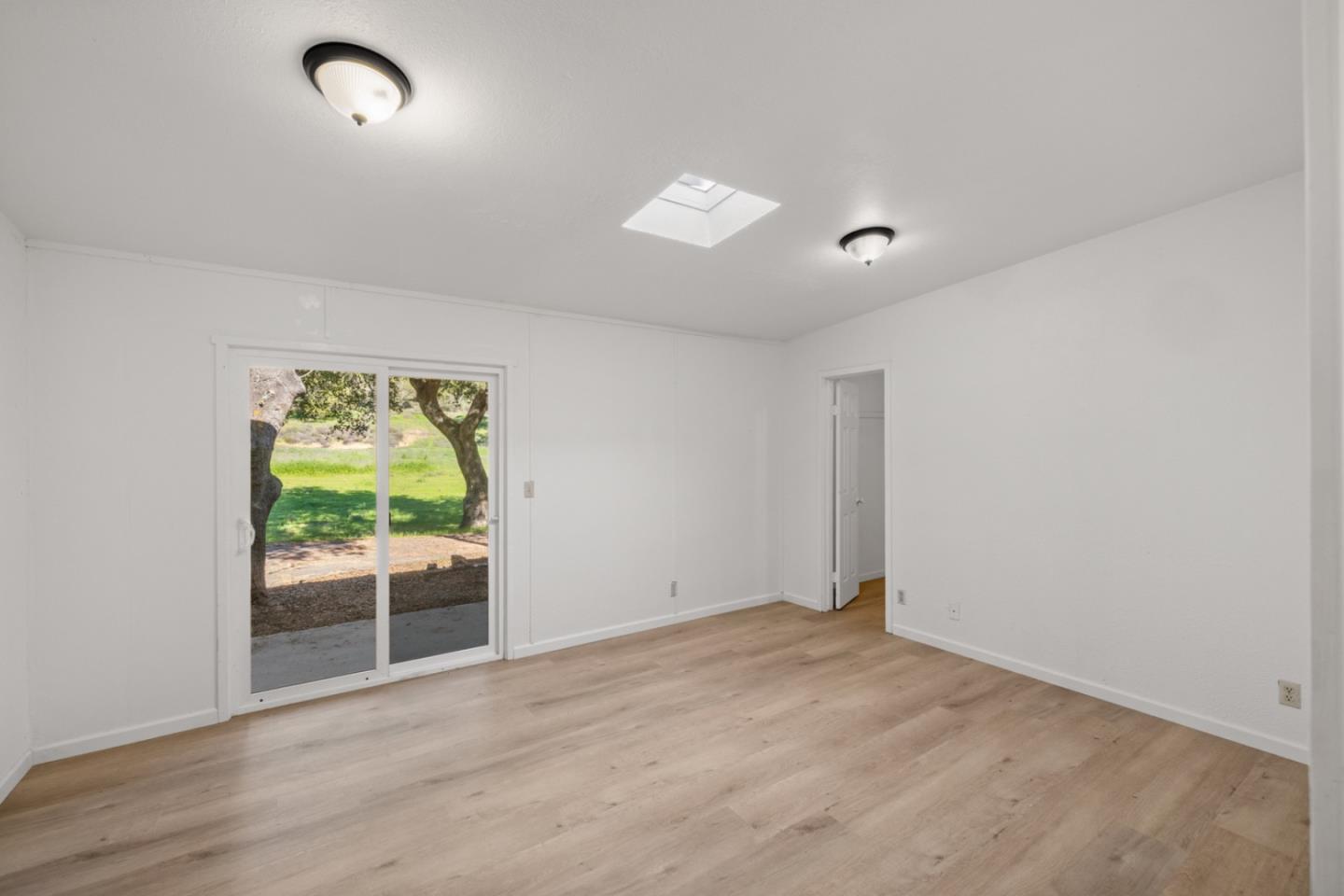 47292 Arroyo Seco Road Greenfield, CA 93927 - Photo 20 of 37 wooden floor in an empty room with a window