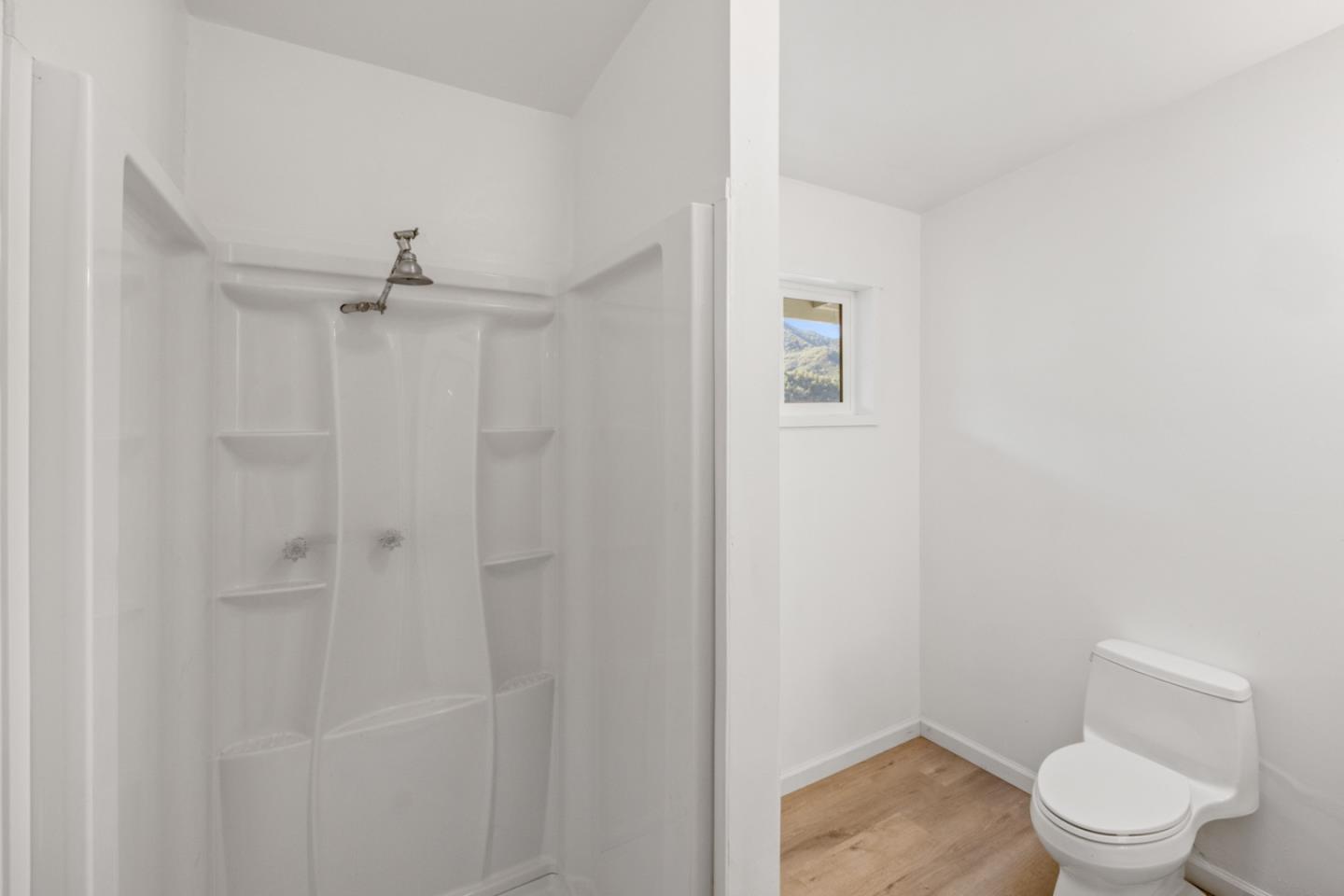 47292 Arroyo Seco Road Greenfield, CA 93927 - Photo 24 of 37 a bathroom with a toilet and a shower