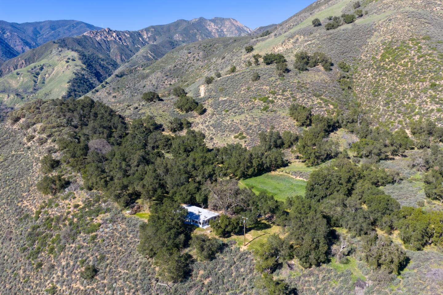 47292 Arroyo Seco Road Greenfield, CA 93927 - Photo 26 of 37 a view of a forest with a mountain in the background
