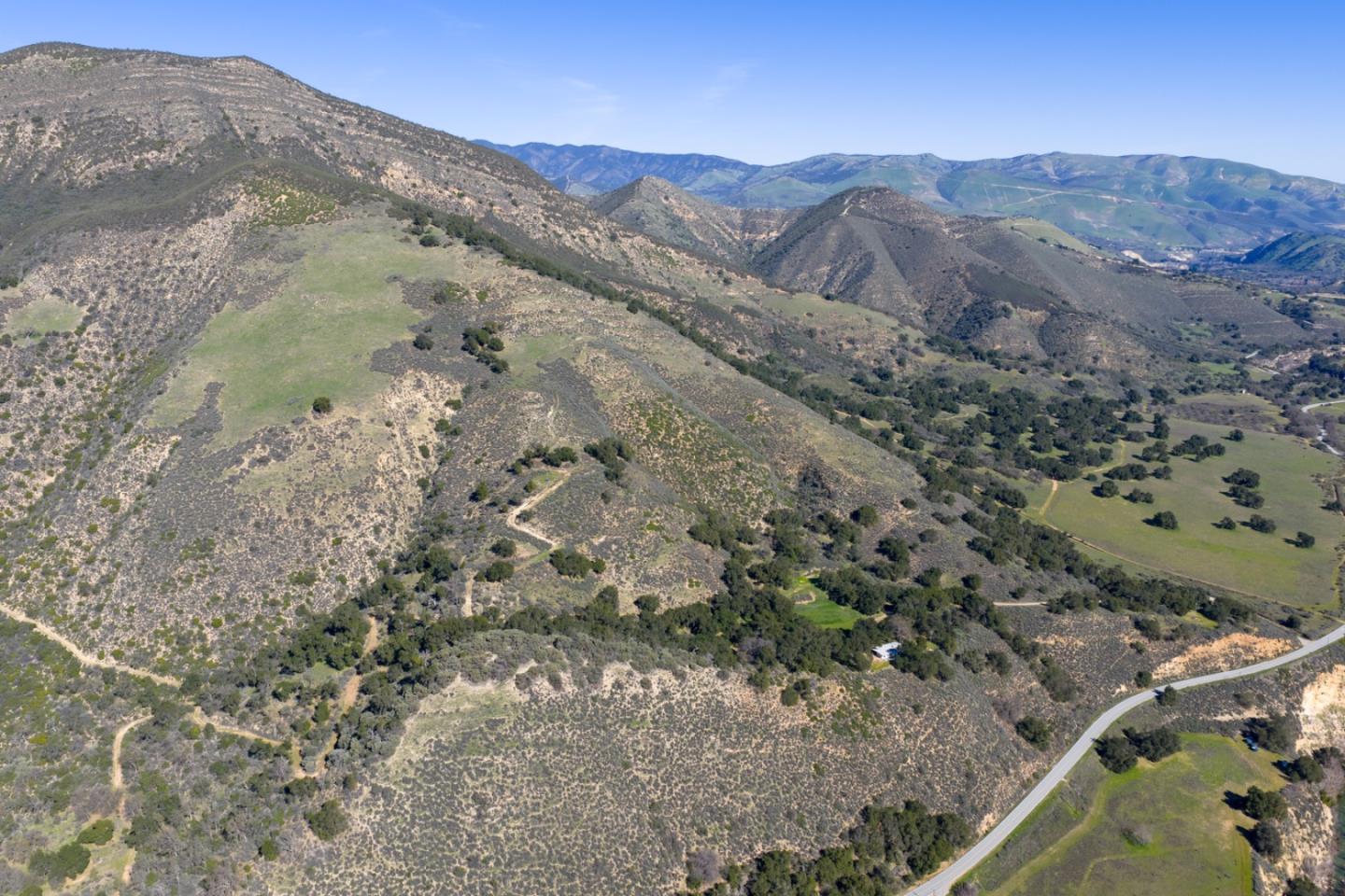 47292 Arroyo Seco Road Greenfield, CA 93927 - Photo 35 of 37 a view of a dry field with mountains in the background