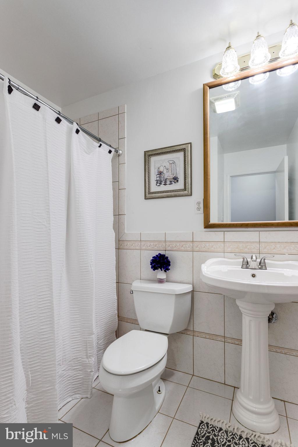 5416 Moultrie Road Springfield, VA 22151 - Photo 11 of 33 Hallway Bathroom