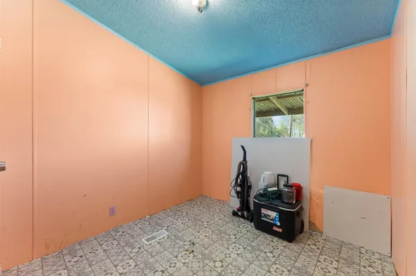 a kitchen with a sink cabinets and stainless steel appliances