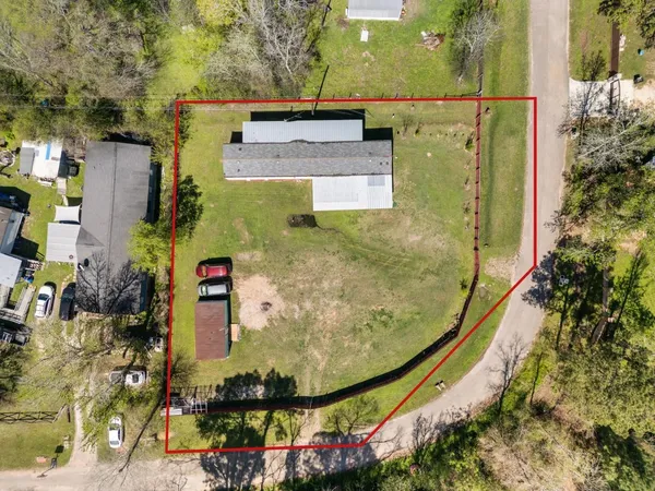 a view of a back yard of the house